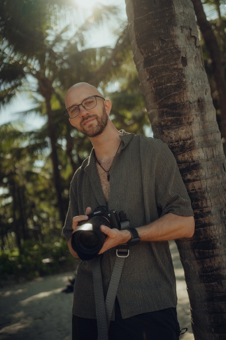 Sebastian, photographer and filmmaker behind BYND NOW, on location with a camera